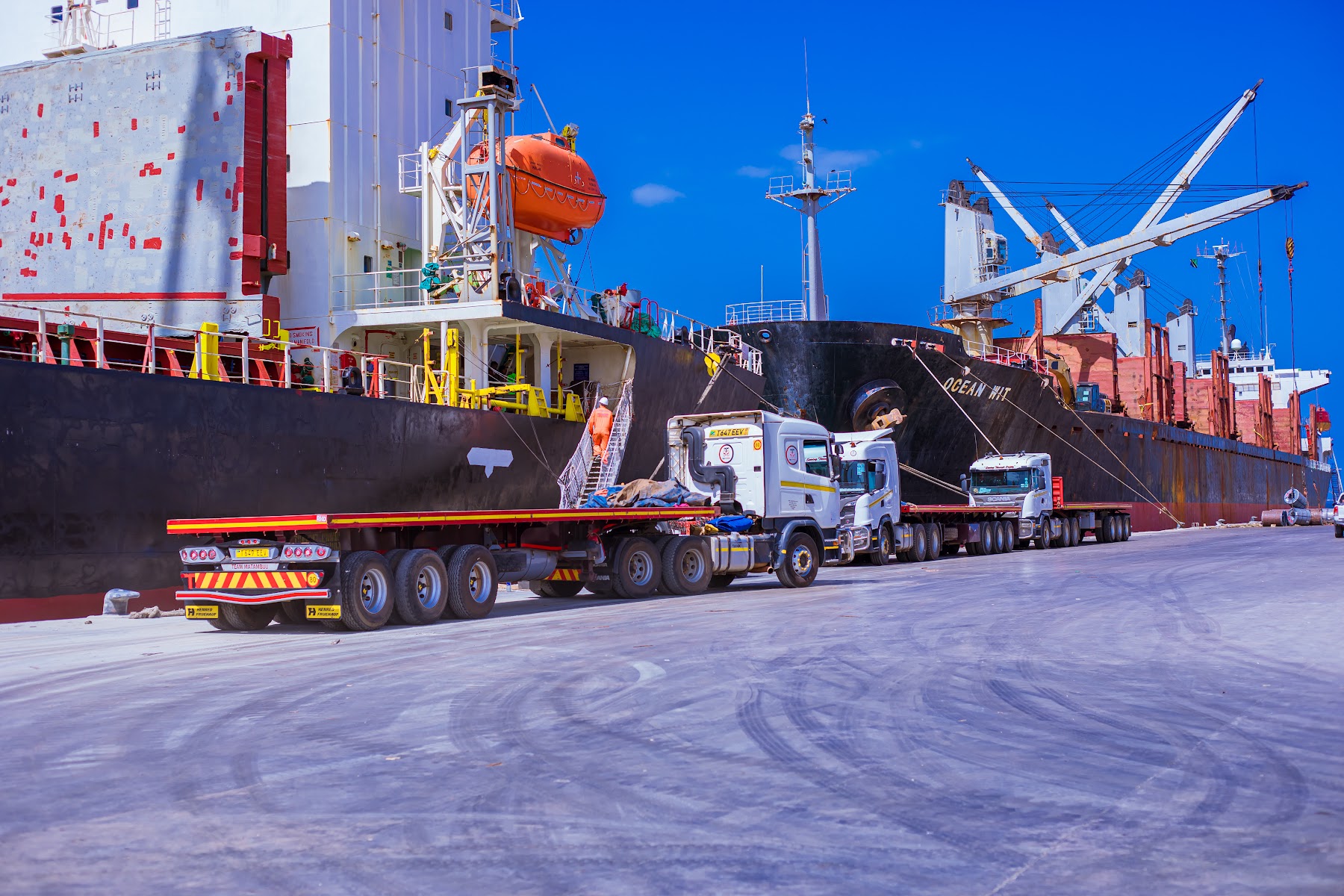 SAS regional transport trucks moving cargo from port operations
